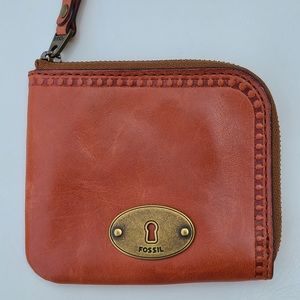 Fossil leather zip-around wallet in burnt orange